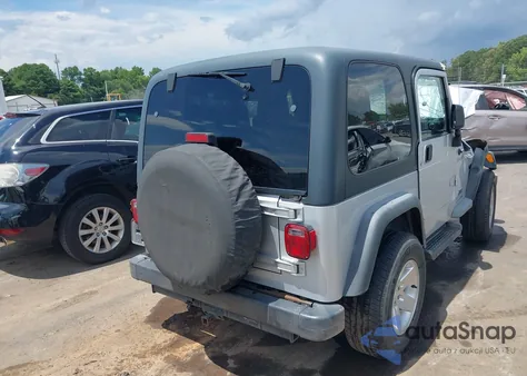 2003 Jeep Wrangler Sport z USA, uszkodzony, nr VIN 1J4FA49S33P313343